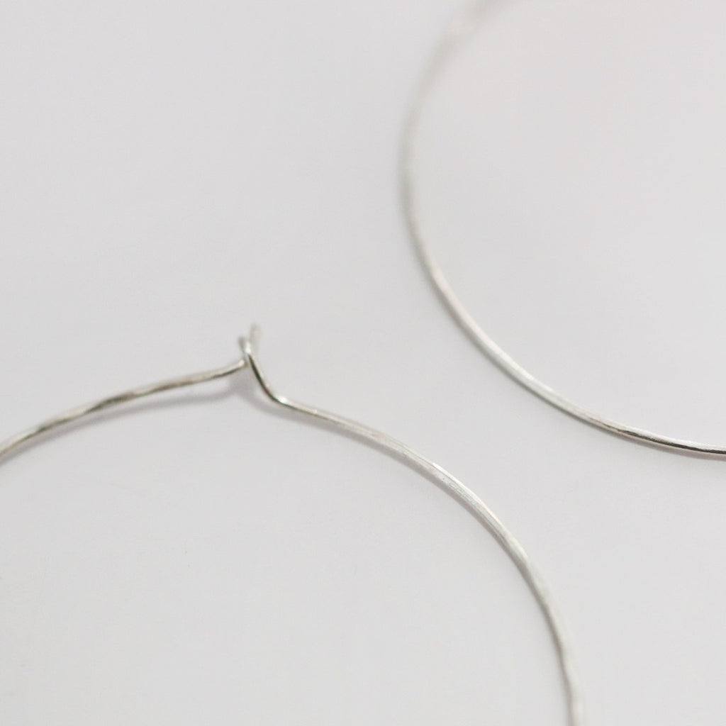 Thin Hammered Hoop Earrings in Sterling Silver