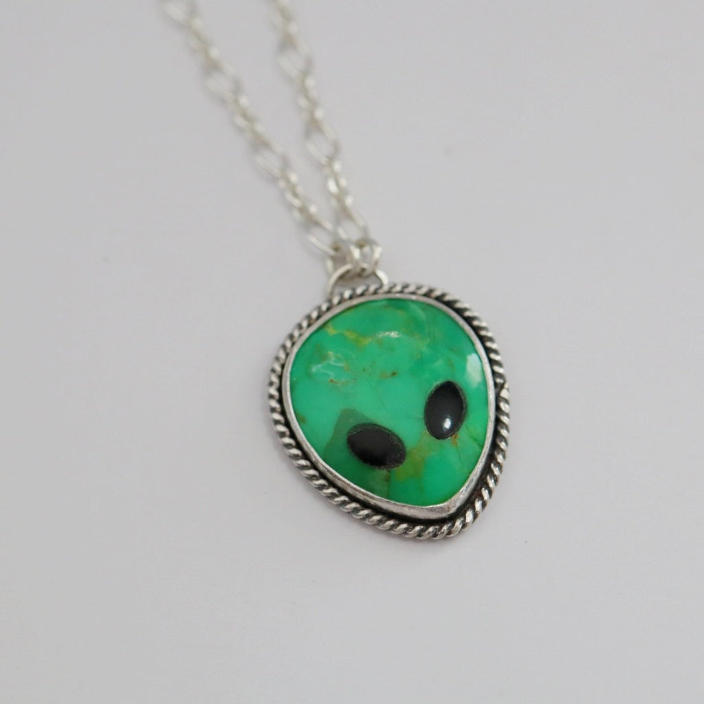 Green alien and sterling silver necklace