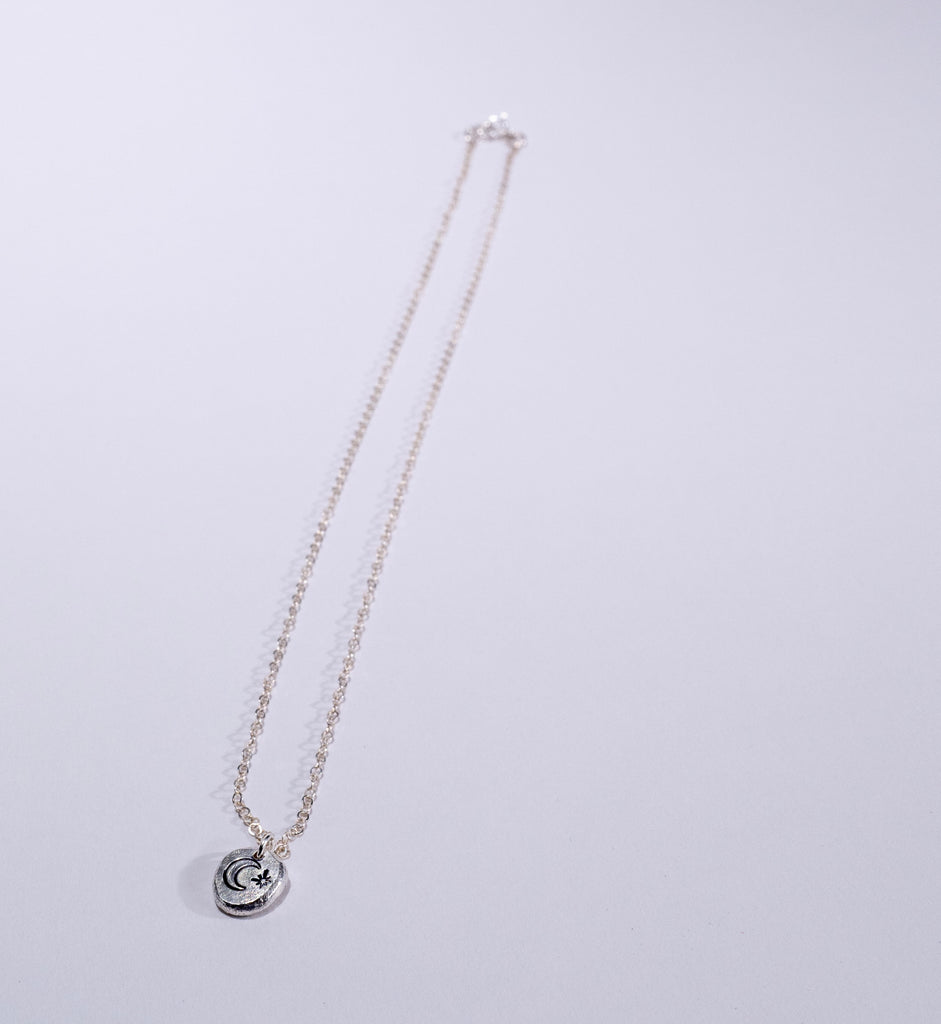 Moon and Star Celestial Stamped Necklace in Sterling Silver